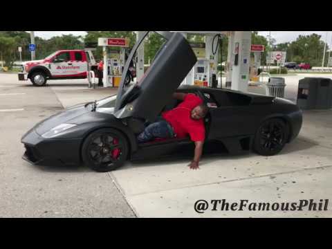 Fat dude struggles to get out of Lambo
